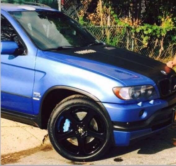 A customer's BMW outside Polo's Auto Body